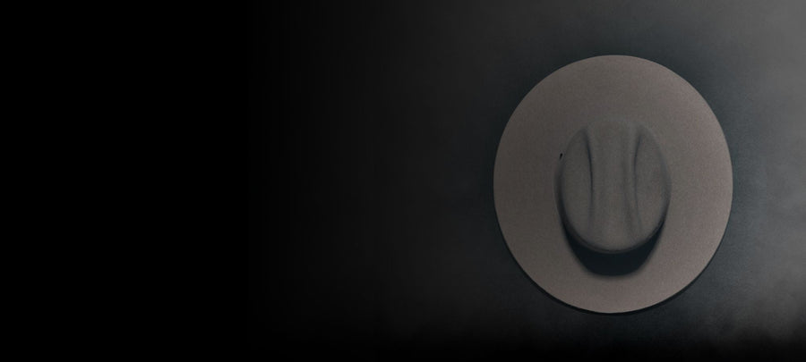 Wide-brimmed felt hat on dark background, Italian handmade hat, premium accessories